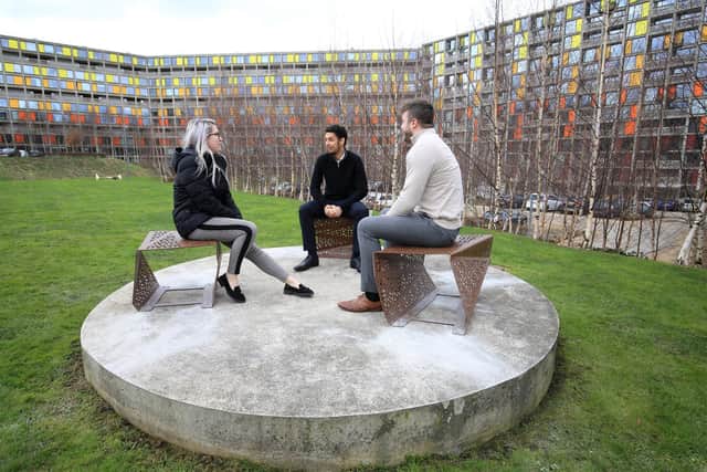 New sculptures being installed at Park Hill in Shefifield. Pictured are Maddie Munro, Cameron Bailey, and Matt Retchless. Picture: Chris Etchells