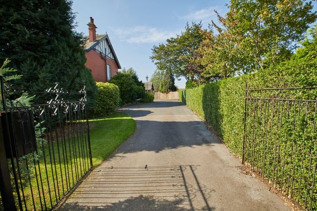 The gated driveway.