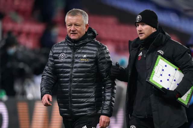 Chris Wilder, Manager of Sheffield United talks to coach Matt Prestridge following the Premier League match between Crystal Palace and Sheffield United at Selhurst Park on January 02, 2021 in London, England.  (Photo by John Walton - Pool/Getty Images)