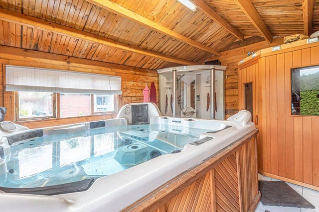 The house has a spa with a large hot tub, sauna and showers.