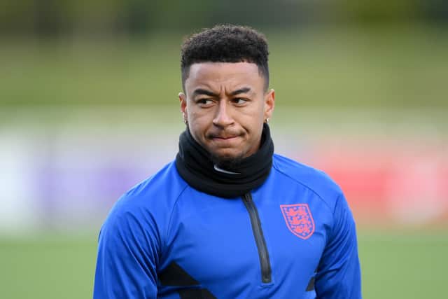 Jesse Lingard reacts during a training session at St Georges Park on October 05, 2021 in Burton-upon-Trent, England. (Photo by Michael Regan/Getty Images)