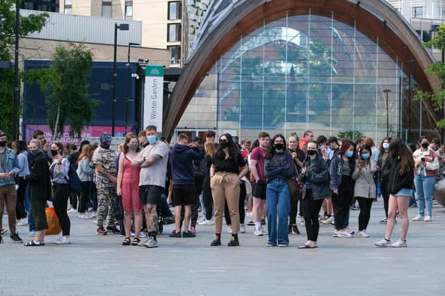 Young Sheffielders queue at the Crucible theatre to get their Covid vaccinations