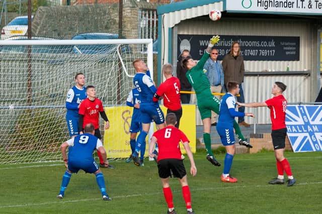 Action from Hallam's win over Parkgate in the FA Vase. Photo: www.focussingonphotography.co.uk