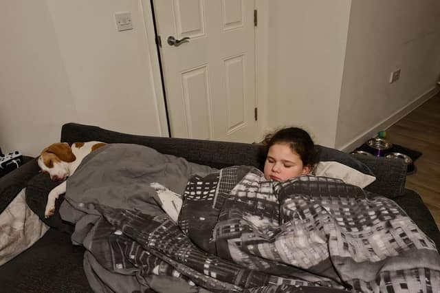 Home learning has all become a bit much for Luna the dog and Angela Smith's daughter, Kayla. Picture: Angela Smith
