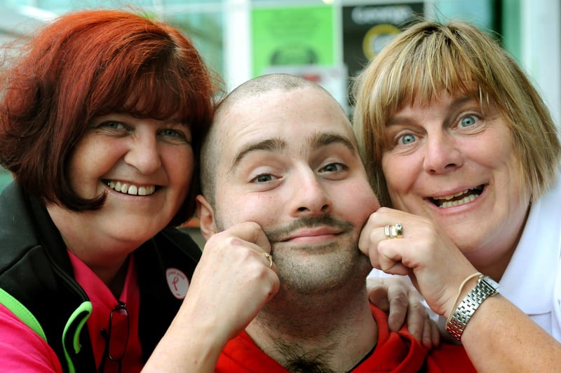 Asda worker Ryan Owens had his hair and beard shaved off to raise money for the Tickled Pink Campaign in 2009. Christine Love, left, and Mavis Maughan were pictured checking Ryan's new look.
