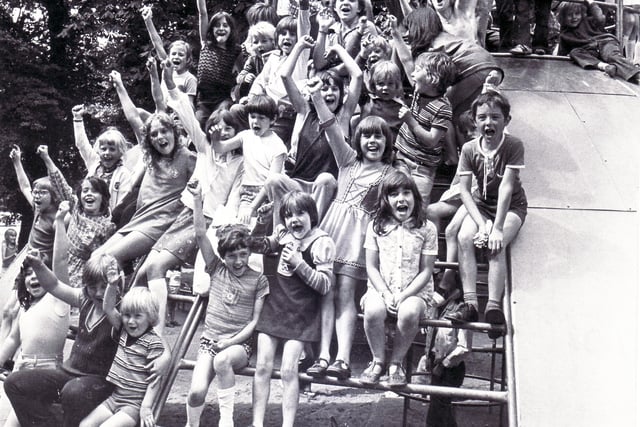 Children on the climbing frame in this Sheffield playground in 1974