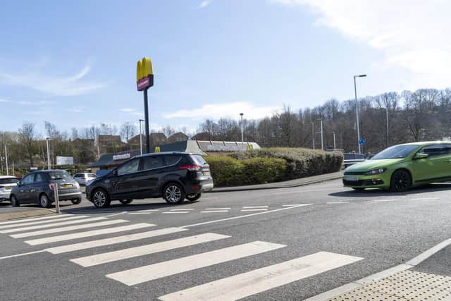 As McDonalds announced the imminent closure of all its UK restaurants large queues formed at many of its Sheffield outlets including Archer Road.  Picture Scott Merrylees