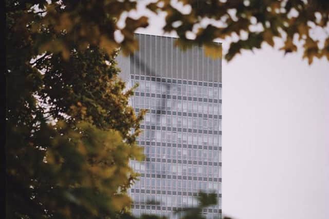 Creative photo of the Arts tower framed by the autumn trees, by @_dto3