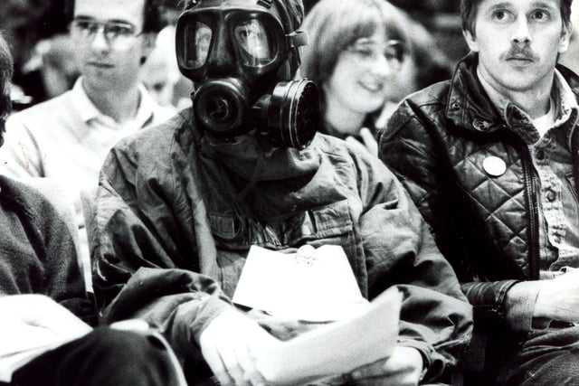 Patrick Clements dressed in fall-out gear at a CND conference in 1983