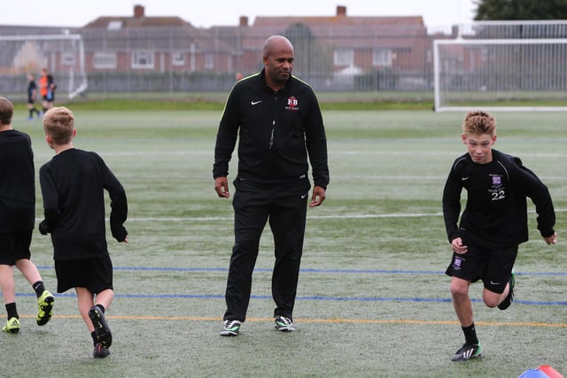 Dean Gordon is pictured at a half-term football coaching session with children in Hartlepool in 2015.