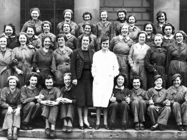 Sheila Bland submitted this picture of her mother, Clara Burnand (second row down, fifth from left), who worked as a crane driver at English Steel Corporation, Sheffield, during the war