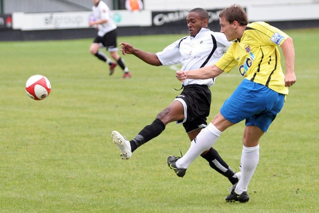Anton Foster challenges for the ball.