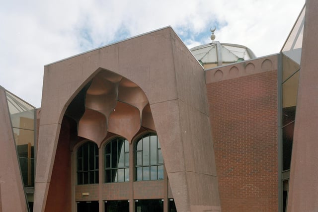 The mosque adopts traditional Islamic architectural forms from the 7th Century, including the iwan archway entrance, and presents them in red brick, glass and concrete.