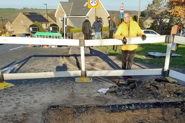 Coun Penny Baker with a repaired gas pipe in Stannington.