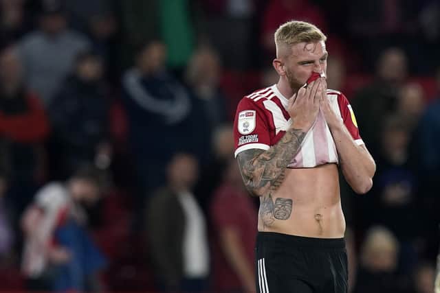 Oli McBurnie of Sheffield United looks on dejected after the final whistle: Simon Bellis / Sportimage