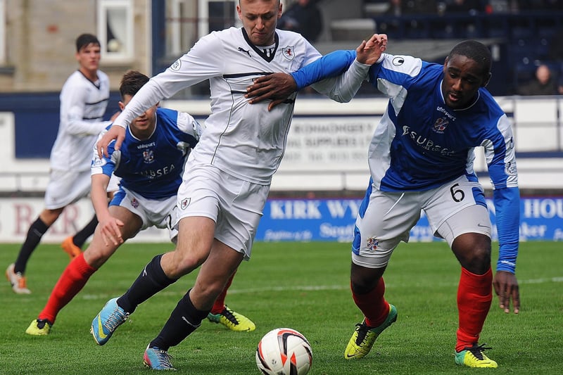 Raith's Greig Spence being impeded by Cowdenbeath's Nat Wedderburn at Stark's Park in April 2014 as the hosts headed to a 2-1 defeat