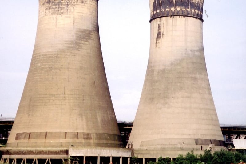 The famous Tinsley cooling towers, taken from the former Blackburn Meadows Power Station site with the M1 motorway Viaduct in the background. This picture was taken in 2003 and the towers were demolished in 2008. Ref no t01918