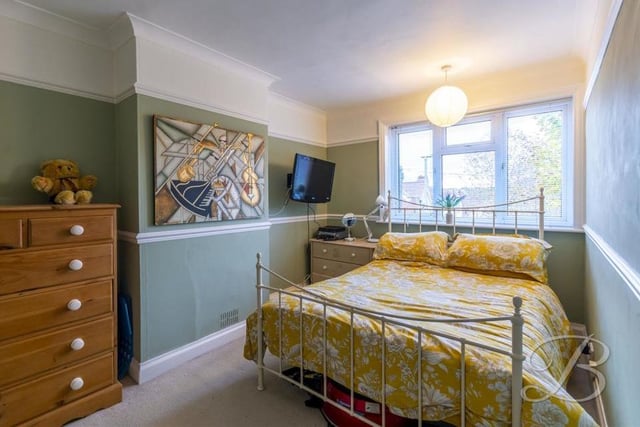 Off the landing, at the top of the stairs, is this, the biggest of the three bedrooms. It features a carpeted floor, central-heating radiator and a window overlooking the front of the house.