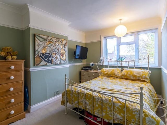 Off the landing, at the top of the stairs, is this, the biggest of the three bedrooms. It features a carpeted floor, central-heating radiator and a window overlooking the front of the house.