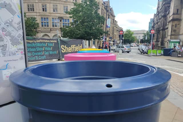 The council has revealed the giant colourful flowerpots will be used for... flowers.