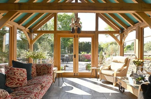 The garden room makes the most of the professionally designed garden.