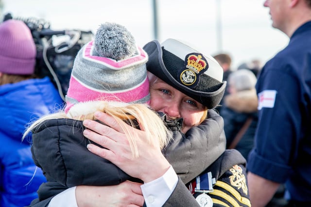Jenni Smith embraces with Evelyn 7 in front of HMS Defender. Picture: Habibur Rahman