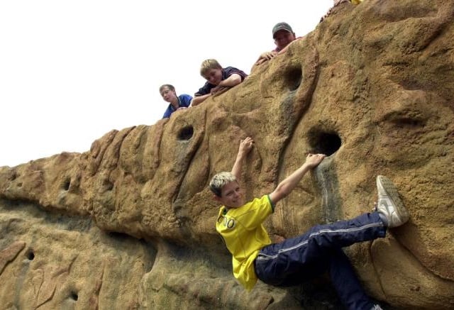 Ricky Taylor tries out the new climbing wall at Hickelton Colliery, 2001.