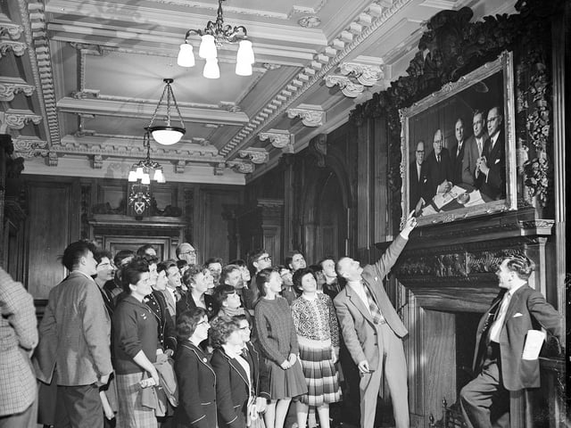 Shetland school children visited The Scotsman newspaper office after getting off school ship at Leith in May 1961. They are pictured looking at a portrait of Scotsman owner Roy Thomson and colleagues.