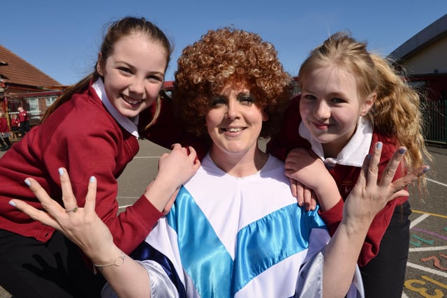 Lisa Dobson (Teaching Assistant) with pupils (left) Grace Arthur and Ruby Reay during the 90th Birthday Celebrations at Valley View Primary School. Remember this in 2018.