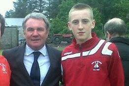 A teenager winger with former Liverpool midfielder Ray Houlton while playing for Swilly Rovers in his native Ireland.