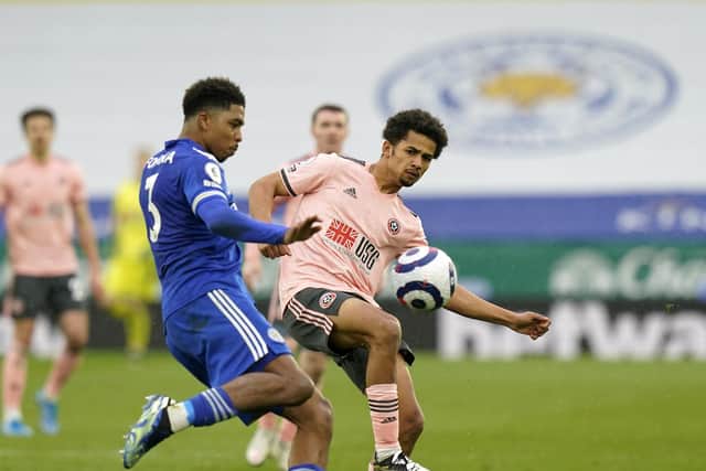 Wesley Fofana of Leicester City tussles with Iliman Ndiaye of Sheffield Utd during the Premier League match at the King Power Stadium, Leicester. Picture date: 14th March 2021. Picture credit should read: Andrew Yates/Sportimage