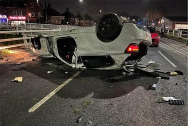 Car flips onto roof in dramatic smash which shut major Sheffield road ...