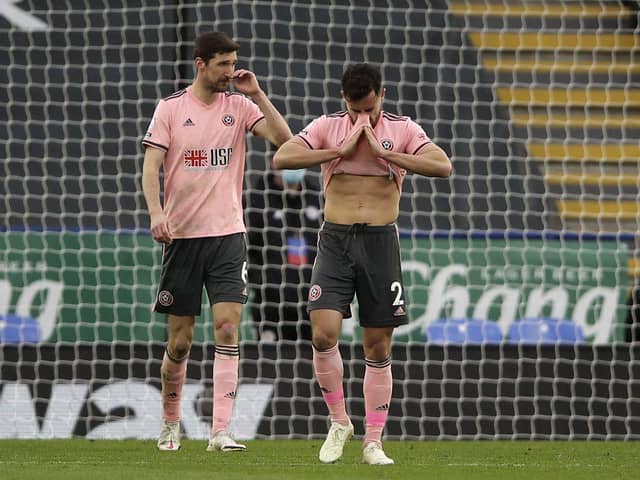 Sheffield United's George Baldock and Chris Basham, left, react after Leicester scored their fourth goal during the Premier League match between Leicester City and Sheffield United at the King Power Stadium. (Molly Darlington/Pool via AP)