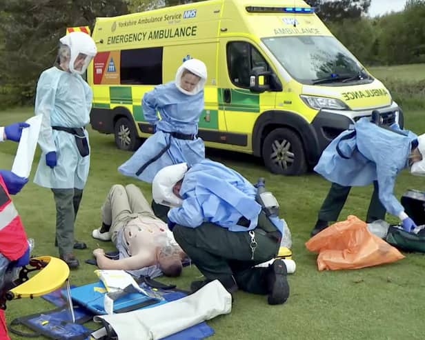 Paramedics attend to John Anderson after he suffers a massive heart attack at Hillsborough Golf Club in Sheffield. He was airlifted to hospital by Yorkshire Air Ambulance, and his story features on the TV show Helicopter ER