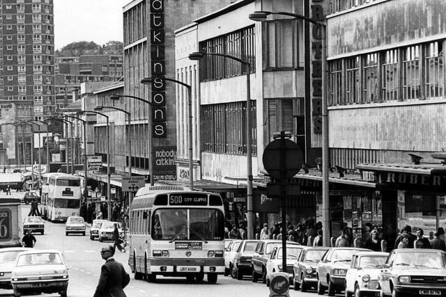 Buses and cars on The Moor, Sheffield, in May 1976