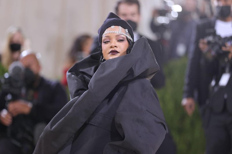 Rihanna always makes a statement at the Met Gala, and this year is no different - the last to arrive at the event, she wore a massive Balenciaga cloak.