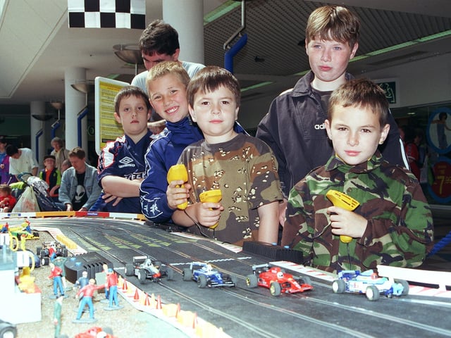 Model car racing championships were held in 1999. Seen are drivers Aaron Blakemore, Matthew Cryer, Ryan Burton, and Lee Marshall in action.