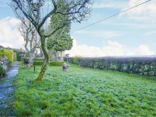 This photo underlines the appealing size of the plot that the £325,000 bungalow stands on. There is even room for a patio area.