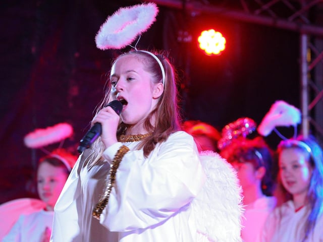 SD Studios Choir performing at the Christmas lights switch on in Palmerston Road, Southsea. Picture: Chris Moorhouse (251121-46).