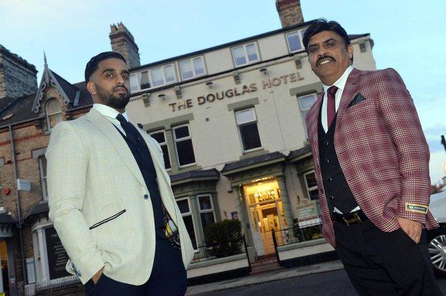 Raqeeb Ramzan (right), who owns The Douglas Hotel featured in Channel 4's programme Four In A Bed to showcase what he believes is the best hotel in town.