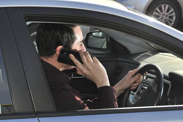 Police will soon be able to more easily prosecute drivers using a hand-held mobile phone at the wheel after the government strengthens existing laws to further improve road safety.