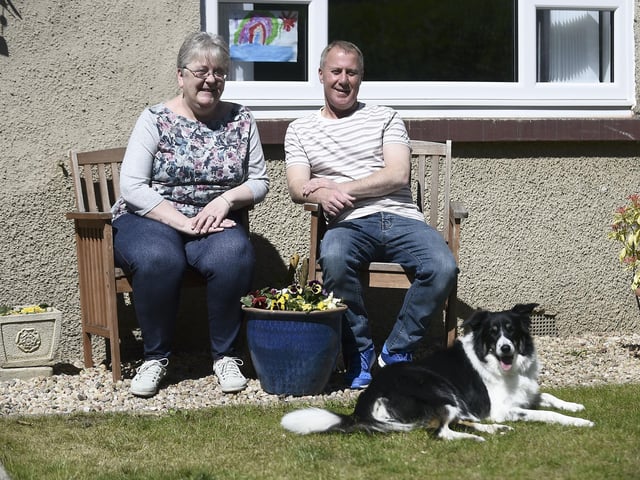Caroline and Kevin McNeish, with Poppy, their border collie, volunteered as they moved here in January, just a few months before the lockdown came into force. Kevin McNeish is a carer and so is still working through the lockdown. Picture: Lisa Ferguson.