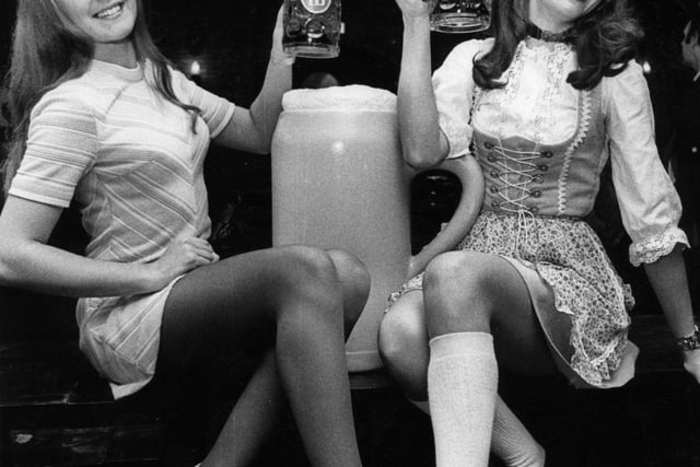 Miss Germany Heidi Webber, right, and Miss Great Britain Elizabeth Robinson at the opening of the Hofbrauhaus, Sheffield on January 12, 1973