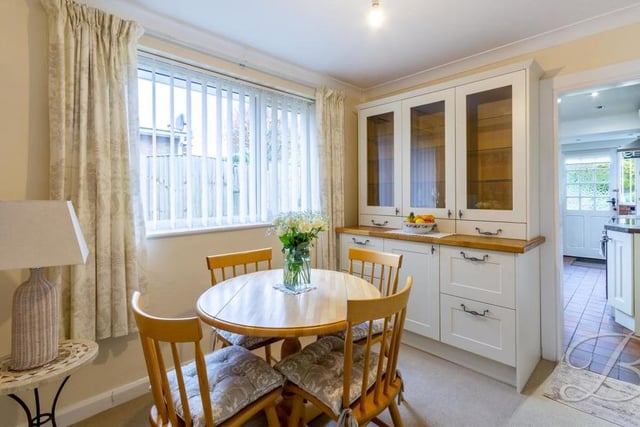 Just off the kitchen is this handy breakfast room. It has a carpeted floor, central-heating radiator and window to the back.