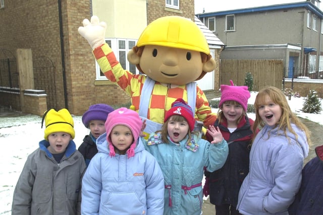Pictured at  The Paddocks, Aston Manor, Swallownest, Sheffield, where Bob the Builder was on hand to help present a cheque for £1000 from Wilcon Homes, to the NSPCC.  While there he met children from Aston Fence Junior and Infants school in January 2001