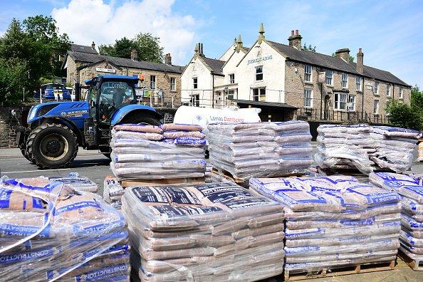 Sandbags were used to help prevent flooding and seen here were stacked up outside Whaley Bridge station