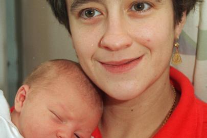 A Christmas day baby in 1997. Mother Helen Guezelkuecuek with her newborn baby Adam.