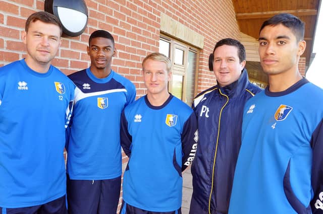 NMAC11-3168-1
Paul Cox with his new signings from left, John Dempster, Niall Rodney, Marcus Kelly and Aman Verna.