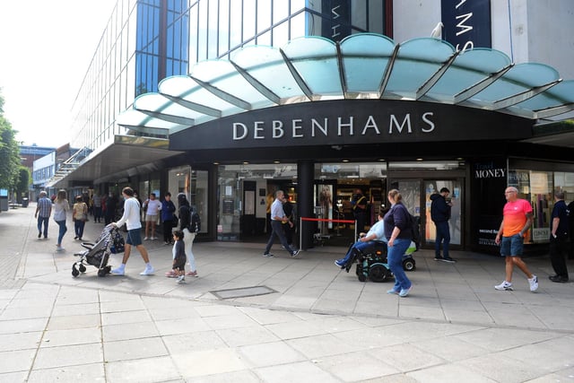 Shoppers queue to get in Debenhams in Commercial Road, Portsmouth. Picture: Sarah Standing (150620-9928)