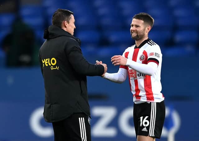 Sheffield United interim manger Paul Heckingbottom (left) and player Oliver Norwood celebrate after the final whistle after victory over Everton: Gareth Copley/PA Wire.